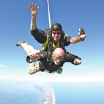 Ninety-year-old Russell Louden is seen before and during his recent skydiving experience. (Courtesy photos)